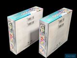 two boxes that are sitting side by side on a black background