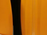 two vases that are sitting on a table