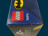 a blue box with a yellow batman logo on it