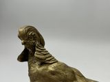 brass figurine of a pheasant on a white background