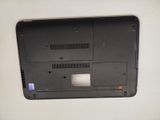 a close up of a laptop on a white surface