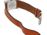 an image of a watch with a brown leather strap on a white background