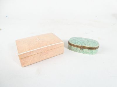 a small box and a small box on a white surface