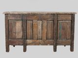a wooden cabinet with a marble top on a white background