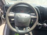 dashboard of a car with a steering wheel and dashboard lights