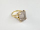 a close up of a ring with a stone on it