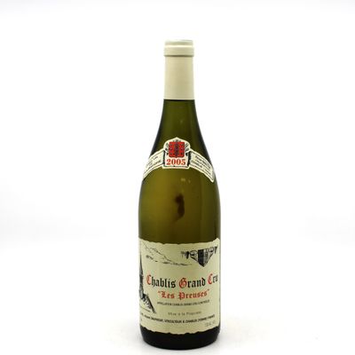 a bottle of wine that is sitting on a table