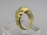 an image of a gold and diamond ring on a clear stand