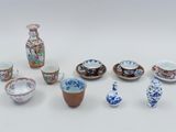 many different types of porcelains on display on the table