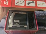 someone is holding a box with some tools inside of it