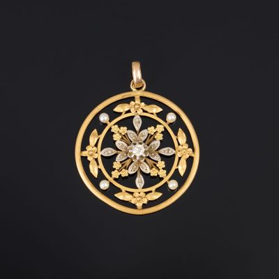 Pendentif rond ajouré en or de deux tons (750‰), serti en so… - Photo 1