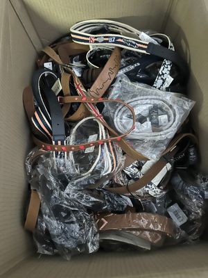 a cardboard box full of electronic equipment in it