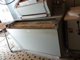 two ovens sitting next to each other in a kitchen