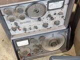 a radio that is sitting on the ground next to a box