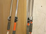 two different types of tools hanging on the wall
