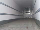 an image of the inside of a truck with the door open