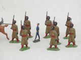 many figurines of men with horses and a horse