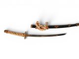 pair of japanese samurai swords with wooden handle and sheaths
