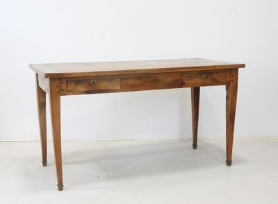 an image of a wooden table with drawers on it