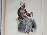 an old book with a drawing of a woman sitting on a chair