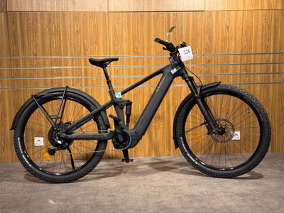 a bicycle that is parked in a garage