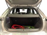 a trunk of a car with a bunch of wires in it