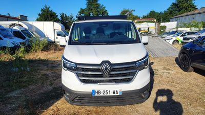 a white van that is parked in a lot
