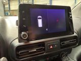 a picture of a car dashboard with a gps device on it