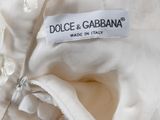 an image of a label on a white dress that says dolce and gabbana made in italy