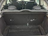 the back of a car with the trunk open and the seats down