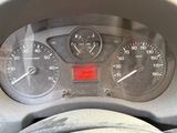 a close up of a car dashboard with a speedometer