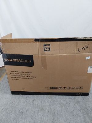 the box is empty on the floor next to the wall