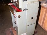 a machine that is sitting on a pallet in a warehouse