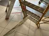a ladder that is sitting in the middle of the floor