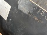 a black box with a piece of bread in it