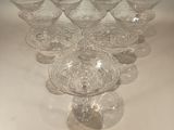 a lot of empty wine glasses sitting on a table