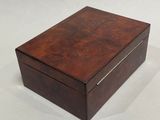 an image of a wooden box on a white surface