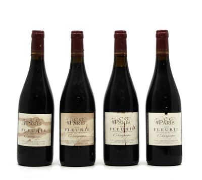 three bottles of wine are lined up on a white surface