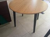 a table that is sitting in the middle of a room