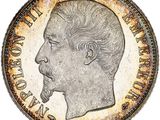a close up of a coin with a man ' s face on it