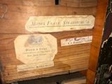 a wooden box that has a label on it