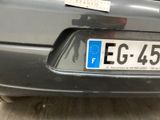 a car that has a license plate on the back of it