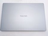 a close up of a laptop on a white surface