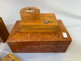 a small wooden box with a star on top of it