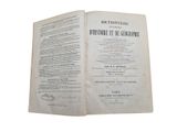 an open book with a black and white image of a document