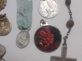 a table with a bunch of religious items on it