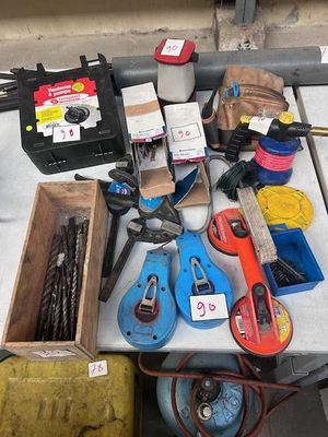 a table with many different tools and tools on it