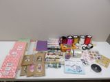 a table with a lot of crafting supplies on it