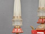 two lamps that are sitting on a table