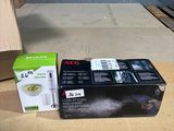 a box of food sitting on the floor next to a cardboard box